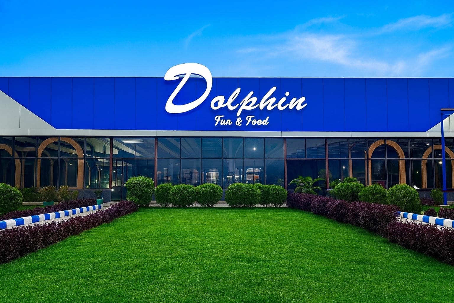 The Dolphin Fun & Food building on NH-44, with its lawn and entrance